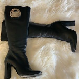 Authentic Gucci leather knee high heel boots.